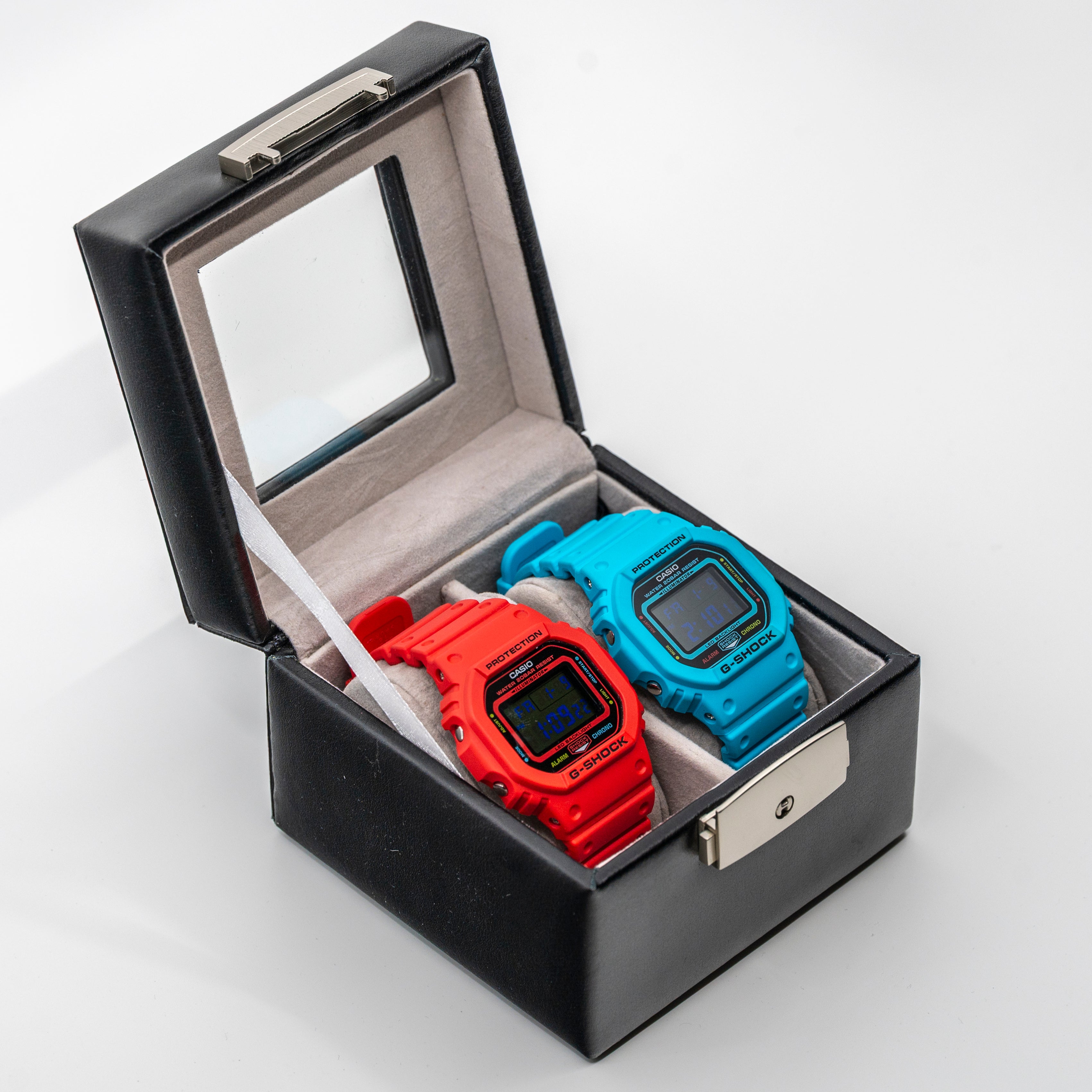 Two Watches: 2 Colorful G-Shocks, a Watch Box (Like New)